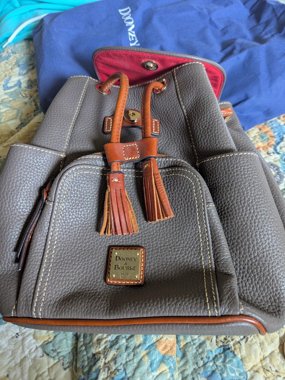 Dooney & Bourke Gray Pebbled Leather Tassel Drawstring Backpack with Brown Trim